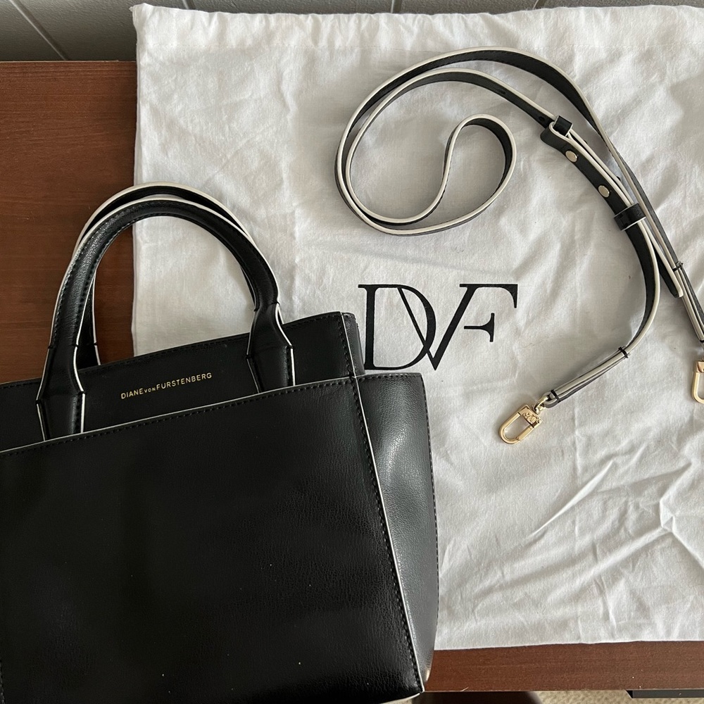 Diane Von Furstenberg black w/ white accent small CrossBody trapeze handbag